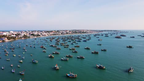 Hundreds-of-fishing-boats-anchored-in-Mui-Ne-bay,-Vietnam