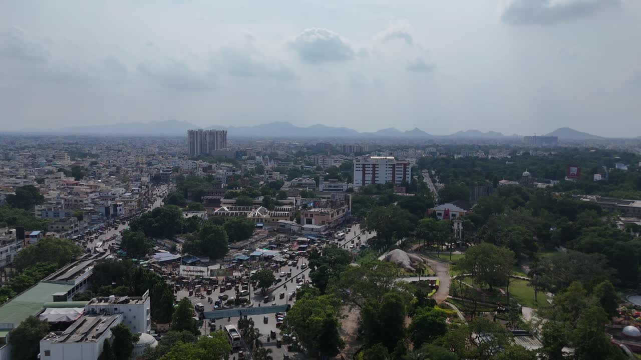 Aerial footage of Vijayawada, close to the state capital of Andhra Pradesh, India, which is Amaravati in the Guntur district, showcasing the city centre area of Vijayawada
