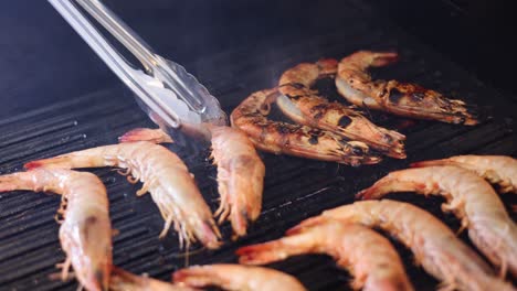 sequential grilling of shrimp on a hot grill