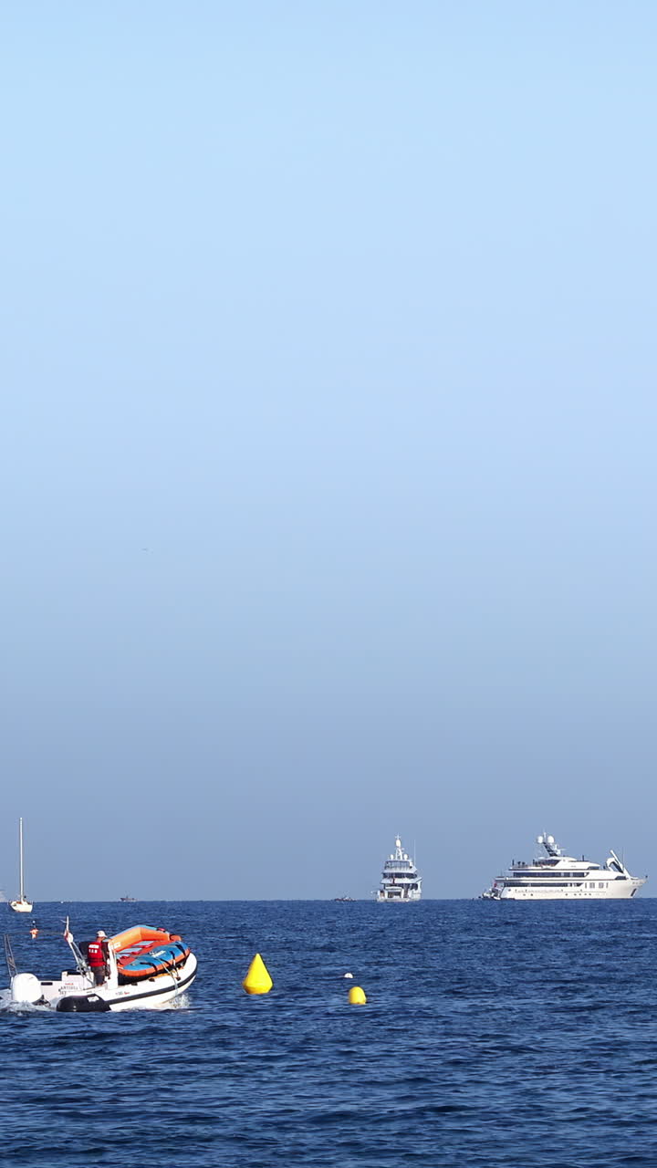 White boat moving on the sea in Golfe-Juan, France