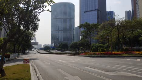 coronavirus outbreak, empty highway of guangzhou city at noon on a sunny day, china