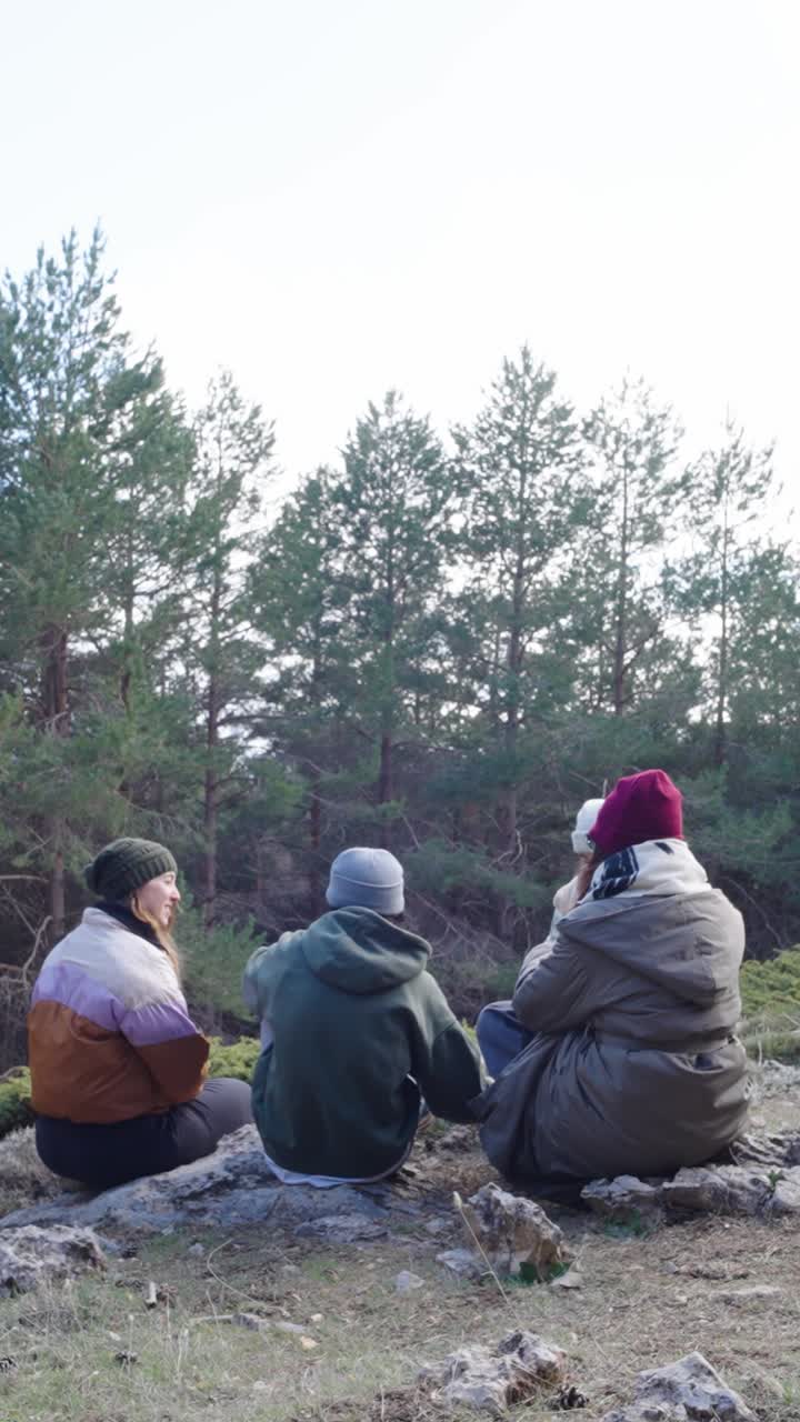 Group of friends enjoying nature in a forest
