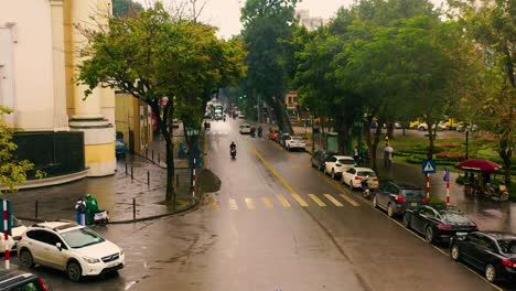 hanoi, vietnam - april, 2020: aerial panorama view of the traffic of the street in the city centre of hanoi in cloudy weather.