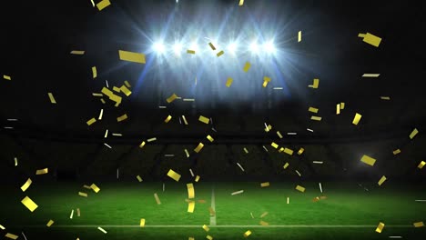 animation of gold confetti falling over floodlit pitch at sports stadium at night