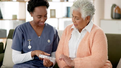 nurse assisting senior woman with medication