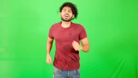 Indian-guy-point-out-with-green-background-indian-guy-standing-on-green-screen---chroma-key