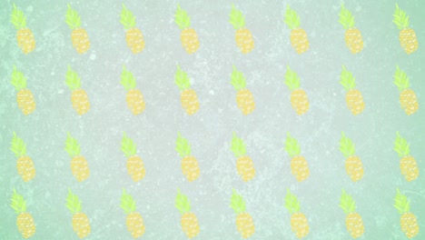 animation of pineapples moving on green background
