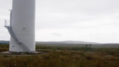 shot of a wind turbine with moor and peatland on the outer hebrides