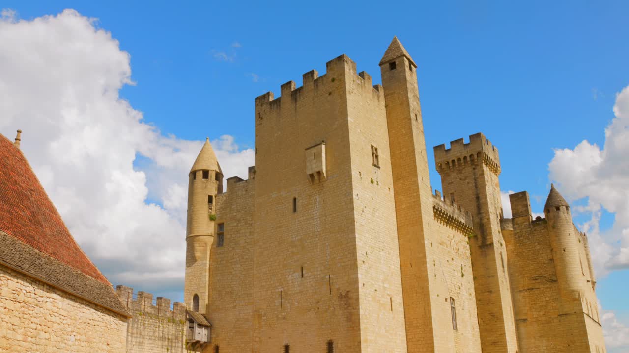 Capturing of architecture of a castle against a blue sky in Beynac, France