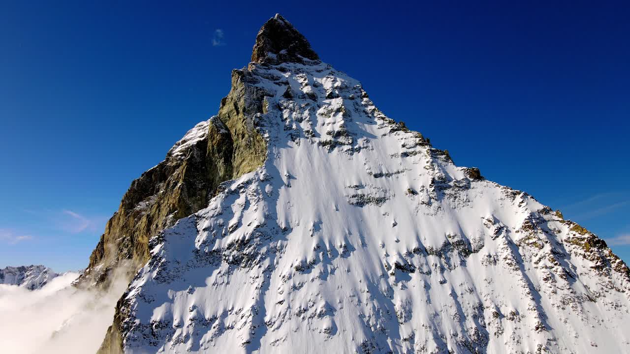 Aerial views of the mountain Matternhorn, covered with snow in Switzerland