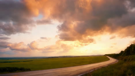 golden hour landscape with road and solitary figure