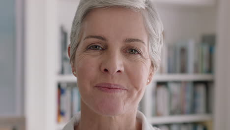 portrait-happy-mature-woman-smiling-confident-midldle-aged-female-enjoying-successful-retirement-feeling-positive-at-home-4k-footage