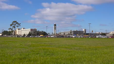 establishing shot of louis armstrong international airport in new orleans louisiana