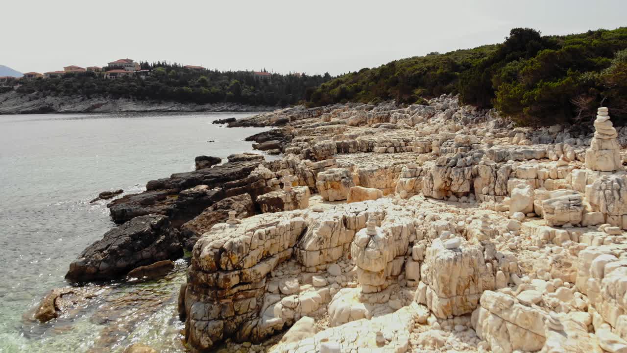 Rock Formations On Alexia Beach In Greece - aerial drone dolly shot