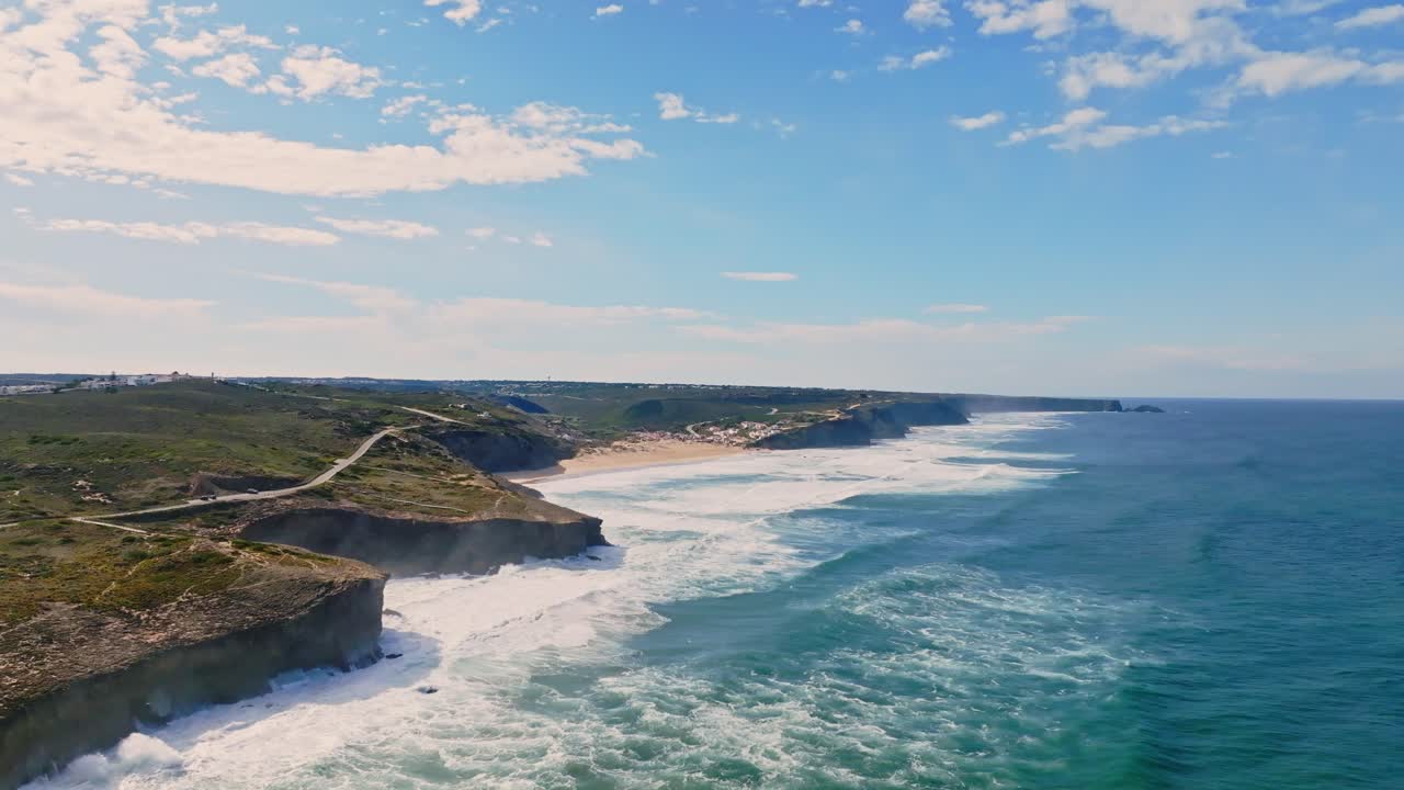 Aerial footage captures the dramatic interplay between land and sea, showcasing the raw, natural power of the Atlantic Ocean.