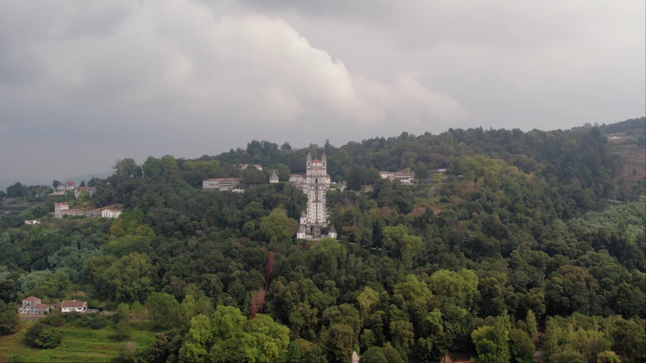 Aerial - Bom Jesus do Monte sanctuary amid forested hills in Braga Portugal