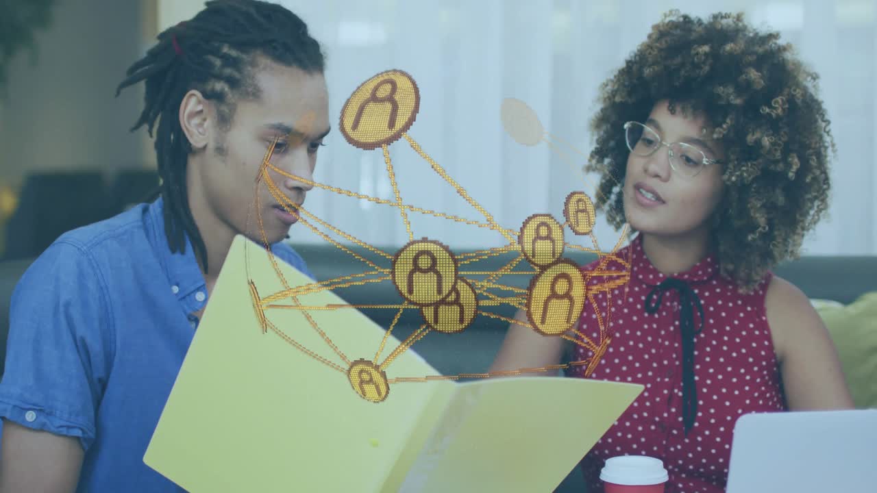 Man opening folder launching holographic tech network, woman pointing at nodes for insight