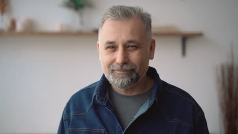 Portrait-Of-Gray-Haired-Mature-Man-With-Beard-Nodding,-Looking-At-Camera-Smiling