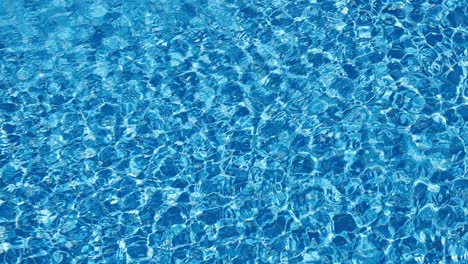 background of water in a swimming pool