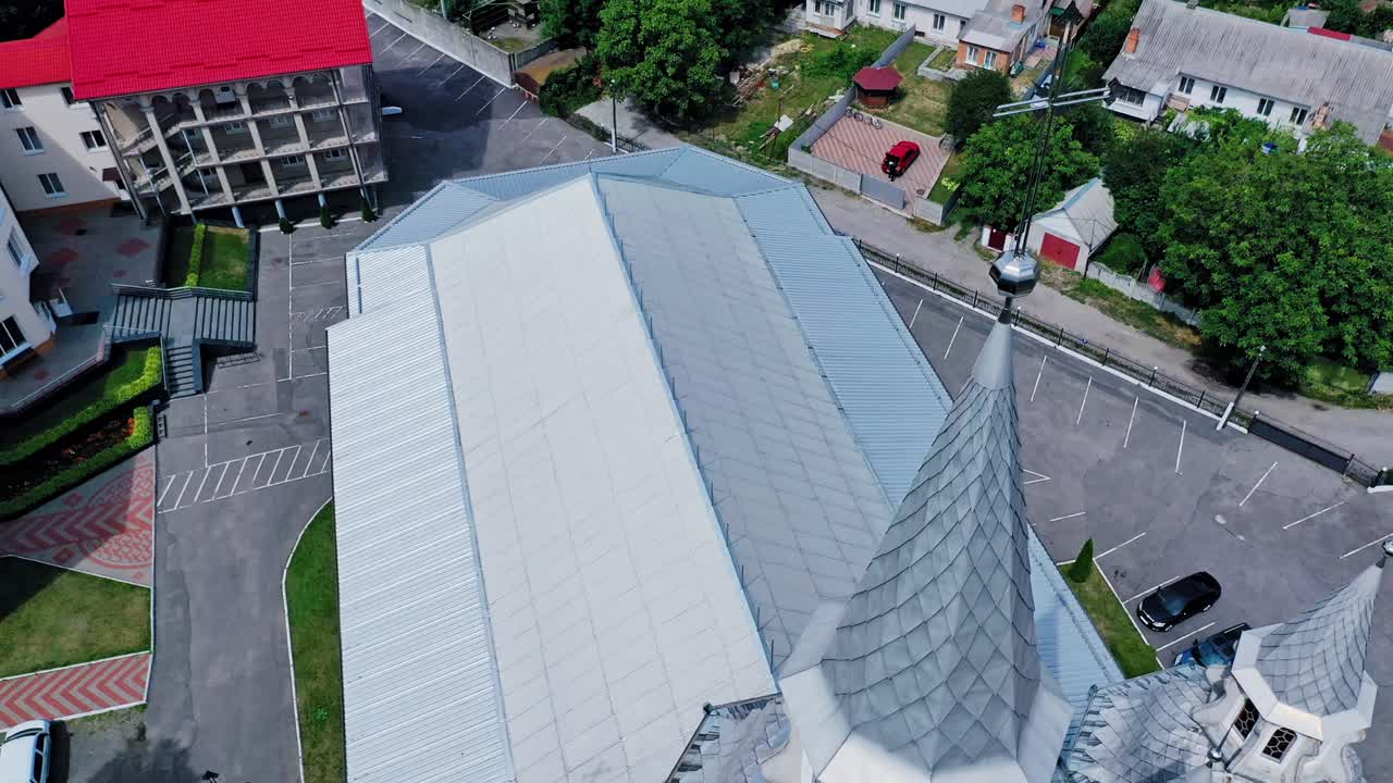 Top down view of church. Aerial view of country landscape with church spire