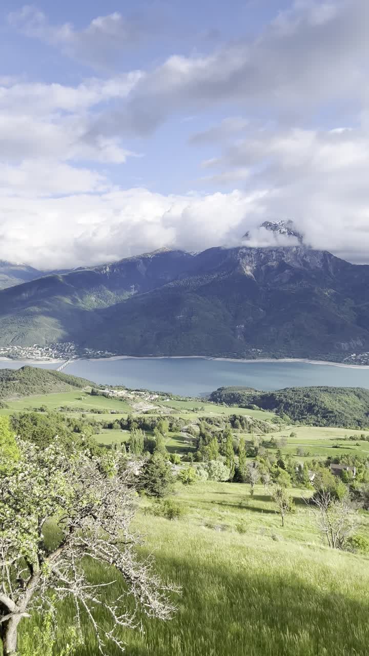 Vertical panorama of the beautiful scenery at Serre Poncon Lake during summer