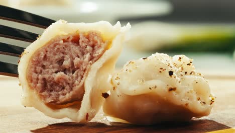 delicious homemade pelmeni on a fork