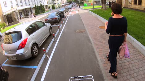 city street scene with bike lane and parking