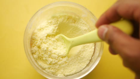 close up of baby formula powder in a jar