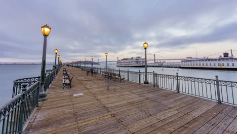 time lapse: san francisco bay bridge and pier