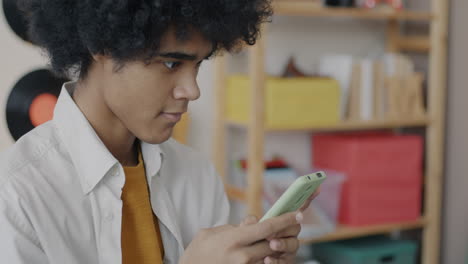 young person texting on smartphone