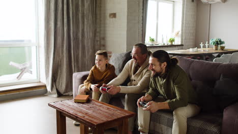 caucasian men and boy in the living room