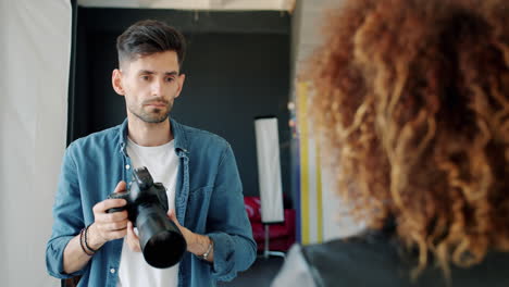 photographer taking a portrait photo in a studio