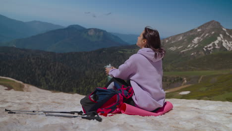 woman enjoying a scenic mountain view