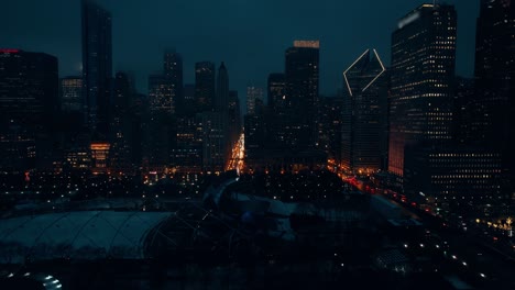 Windy-City-at-night---a-mesmerizing-cityscape-illuminated-by-towering-skyscrapers,-breathtaking-architecture,-and-a-lively-urban-atmosphere