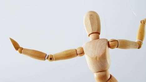 Figurine-dancing-on-white-background