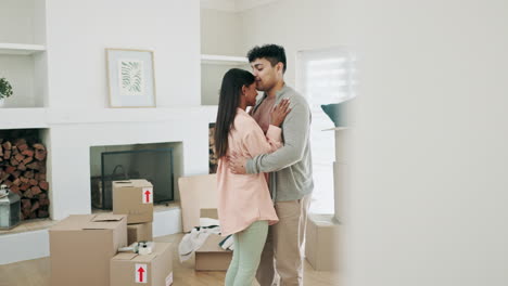 couple, dancing and kiss to celebrate new home