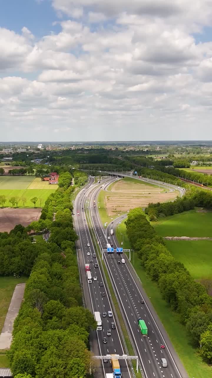 Aerial View of a Highway Interchange with Traffic in the Countryside