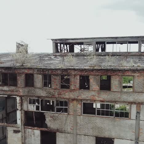 drone flies over an abandoned factory. old abandoned factory building. aerial view