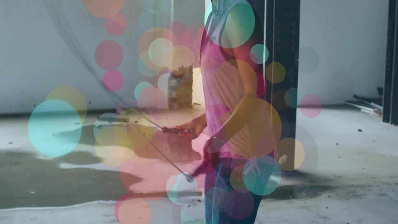 manchas coloridas de luces moviéndose contra mujeres afroamericanas saltando cuerdas