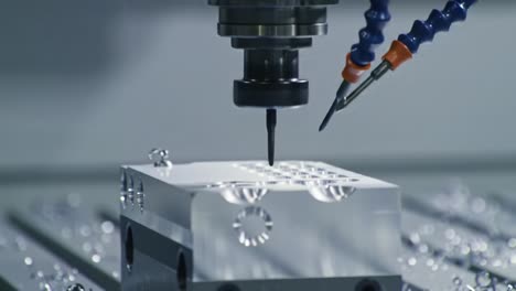 a machining process occurs in a factory setting, showcasing a cutting tool shaping metal. sparks fly as the tool works, and coolant is applied to manage temperature and debris.