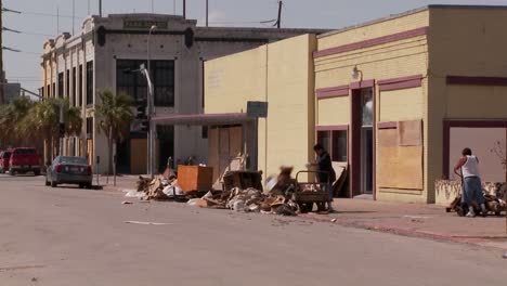 cleanup crews work in galveston texas after hurricane ike