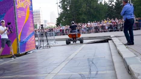 quad bike stunt show in city