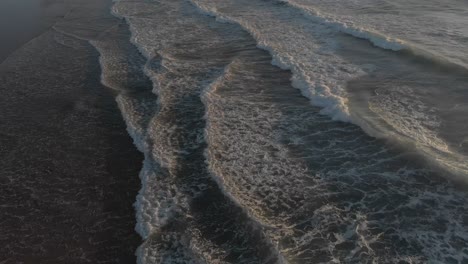 calm waves crashing on the beach