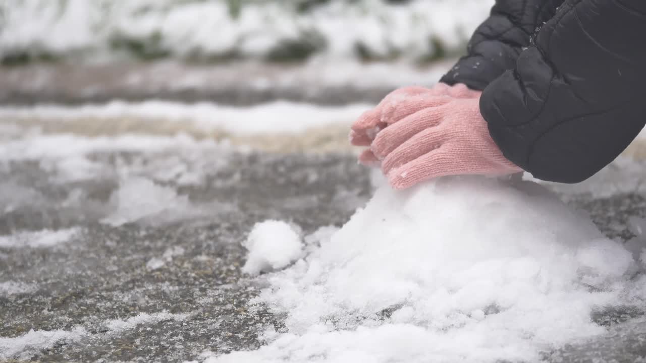 Making snowballs in winter