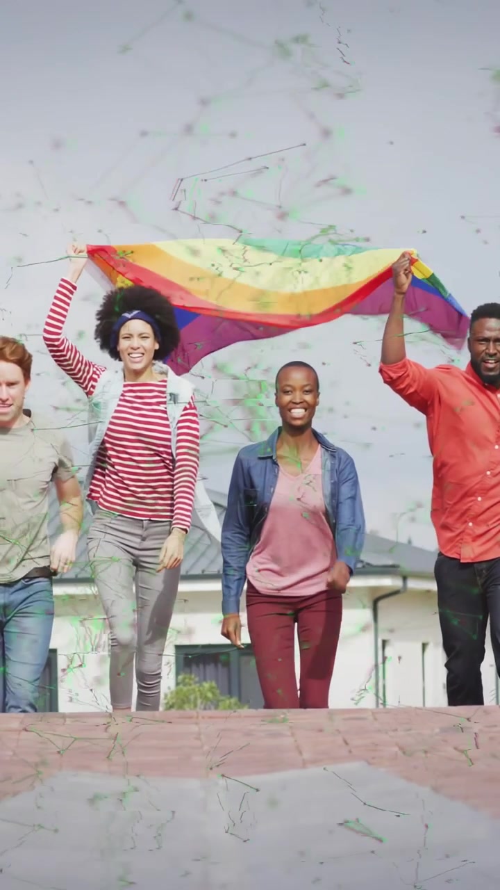 Vertical video: Four adults walking roof, motion causing flag unfurling and animated faces for ads