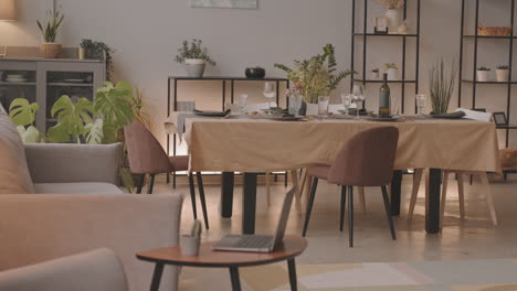 modern dining room with a table set for dinner