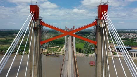 argentine bridge of zarate where some vehicles are crossing over it