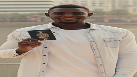 man holding a canadian passport