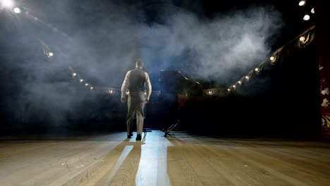 pianist walking to the piano on the stage