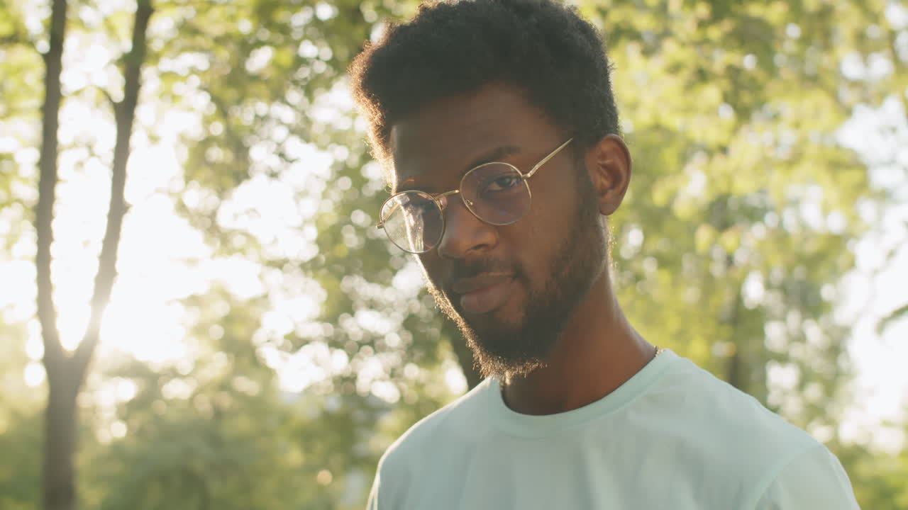 Portrait of Young African American  Man Outdoors on Sunny Day